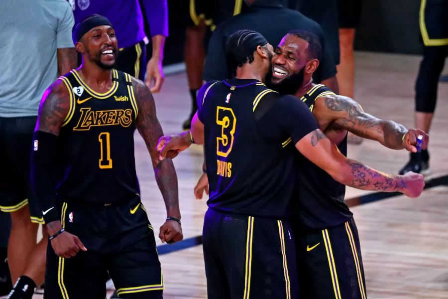 LeBron (23) & AD (3) embrace each other after an emotional Game 2 win