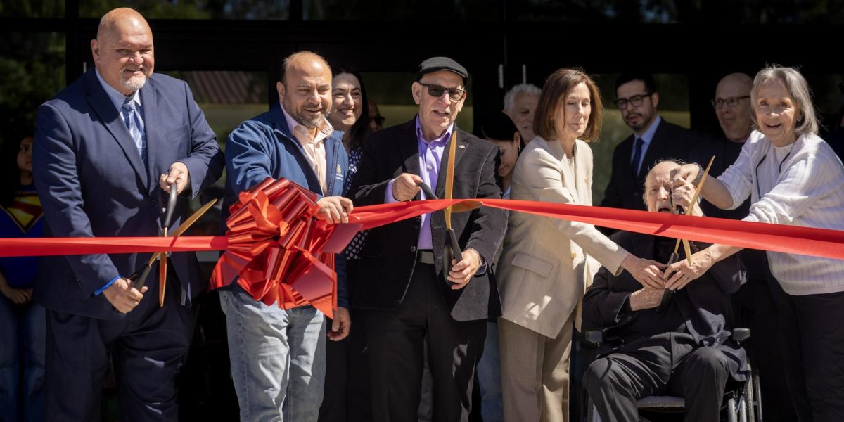 Principal Ricardo Rosales, LAUSD Board Member Scott M. Schmerelson, John Williams and other officials cut the ribbon at the inaugural grand opening of the John Williams Performing Arts center on April 29.